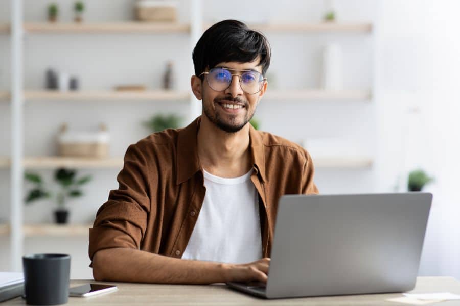 student using fundi laptop to study for exams