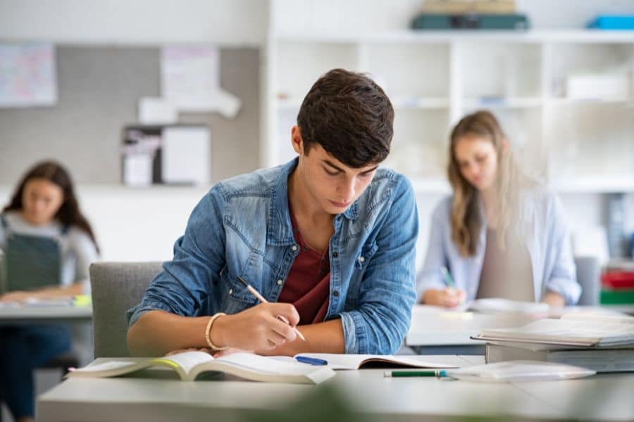 student studying for exams in positive environment