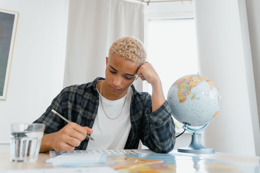 student writing notes during load shedding
