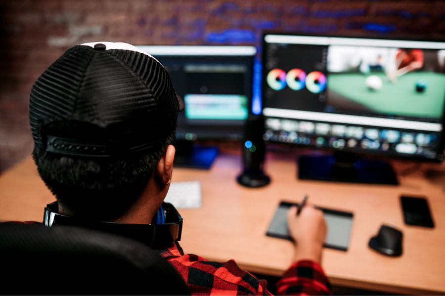 student working online as a video editor