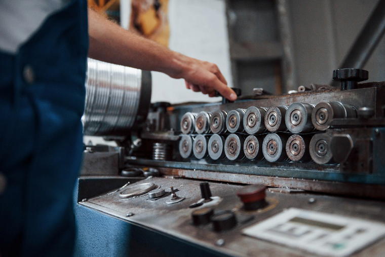 Millwright fixing a machine