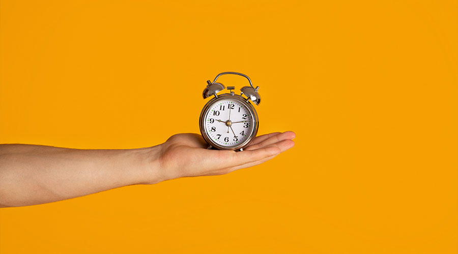 hand-holding-clock